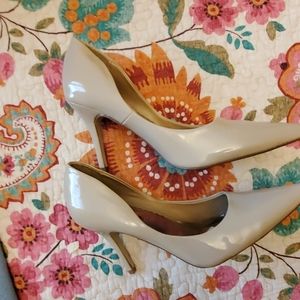Never worn- too high for me- 3/4 heels.